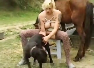 Blonde zoophile fucking a horse and a dog at the same time in MMF
