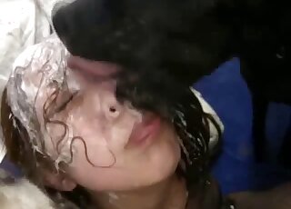 Japanese teen tries sloppy oral perversions with a dog