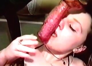 Bestiality sex loving bitch cannot stop sucking her dog’s pink dong