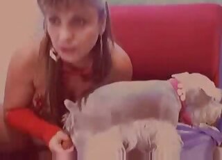 Animal-loving webcam model fucks her white dog in a kinky bid