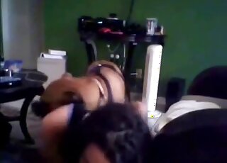 Brunette with long hair moans while fucking a dog in the bedroom